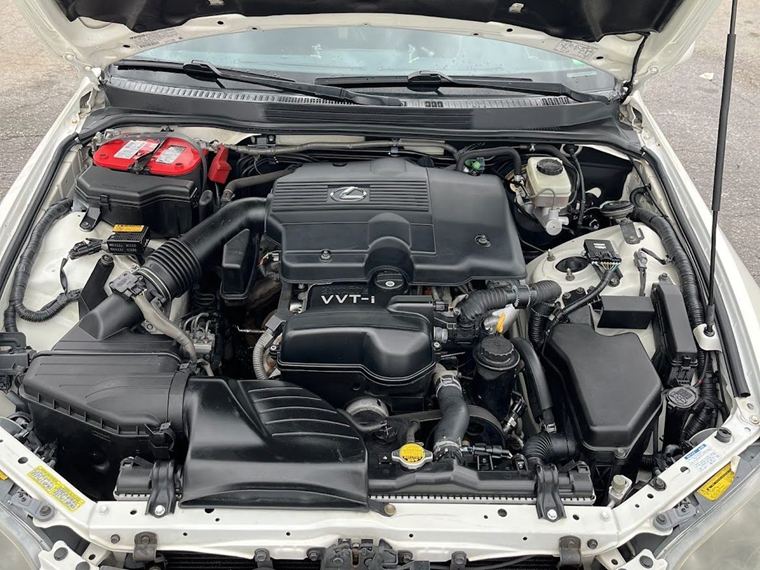 The same engine bay cleaned and dressed to a satin finish