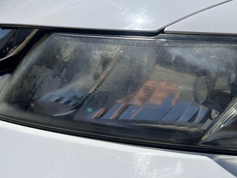 Hazy, oxidised headlight lens before restoration