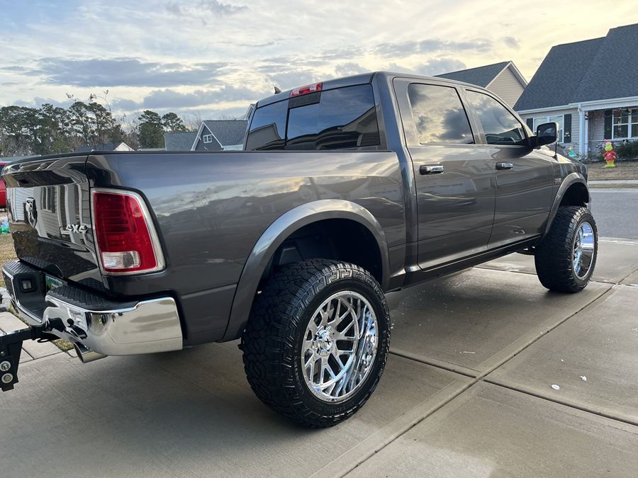 Lifted Ram 1500 with wheels and paint detailed by Perfection Shine Co.